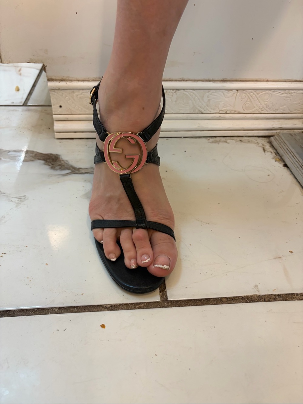 Gucci Black T-Strap Sandals with Gold Logo Medallion